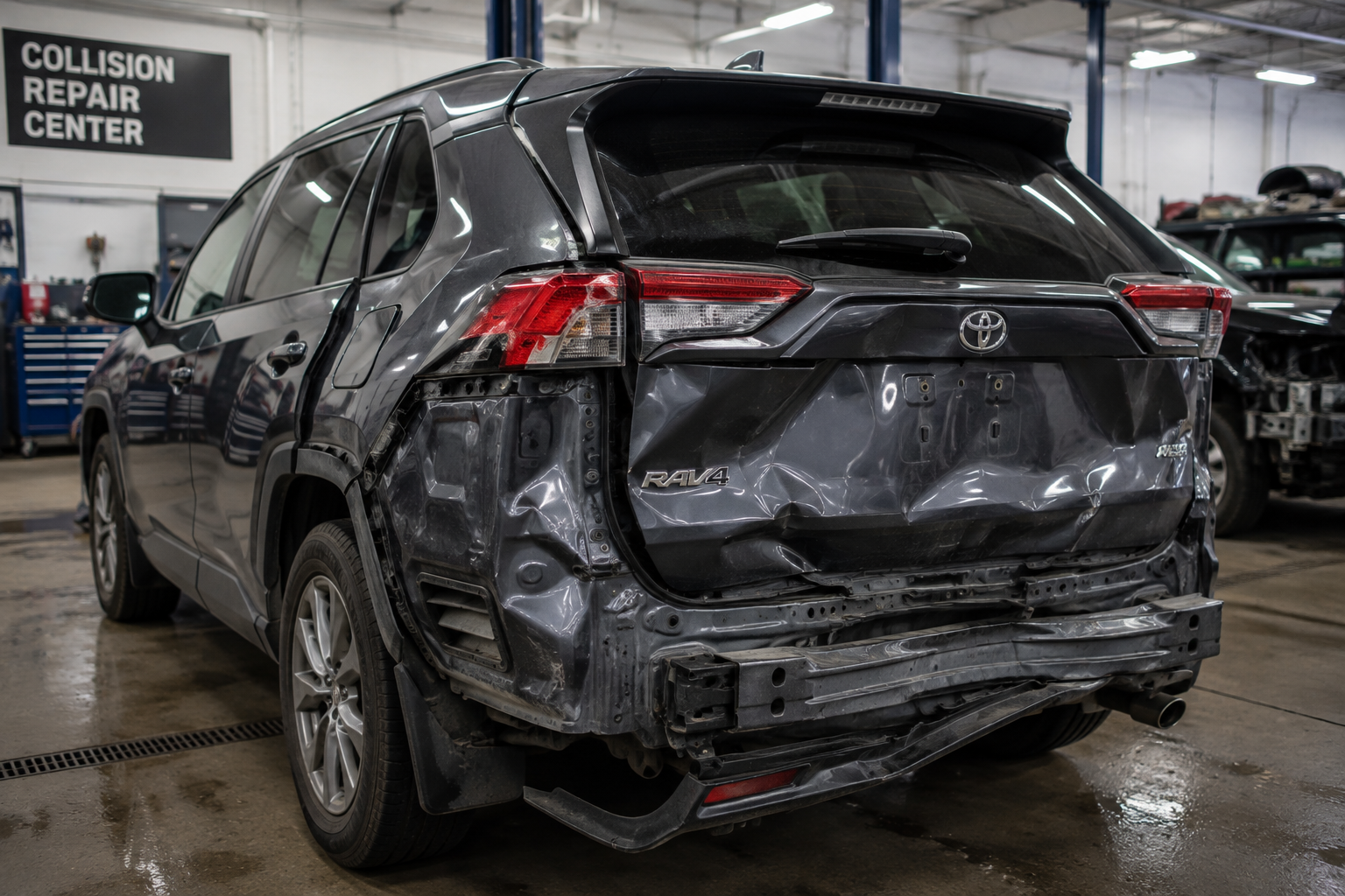 Toyota RAV4 with rear collision damage at Toyota Collision Shop Michigan